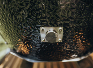 Monolith Le Chef Pro Series 2.0 Kamado Grill ash drawer detail, designed for easy cleaning and efficient airflow management.