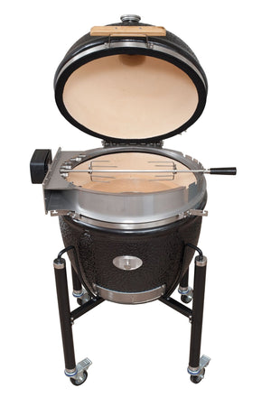 Monolith LeChef Rotisserie on kamado grill with spit rod in place, designed for even heat distribution