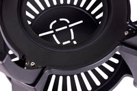 Close-up of black grill cart with ventilation slots and sturdy construction