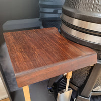 Dark wood side table with metal support bracket