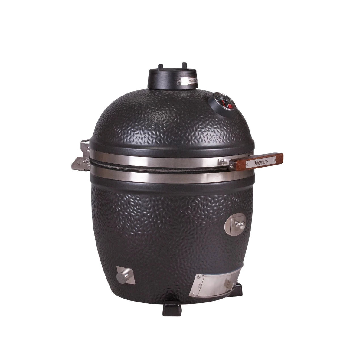 Person handling Monolith Avantgarde Kamado Grill with grilling rack inside