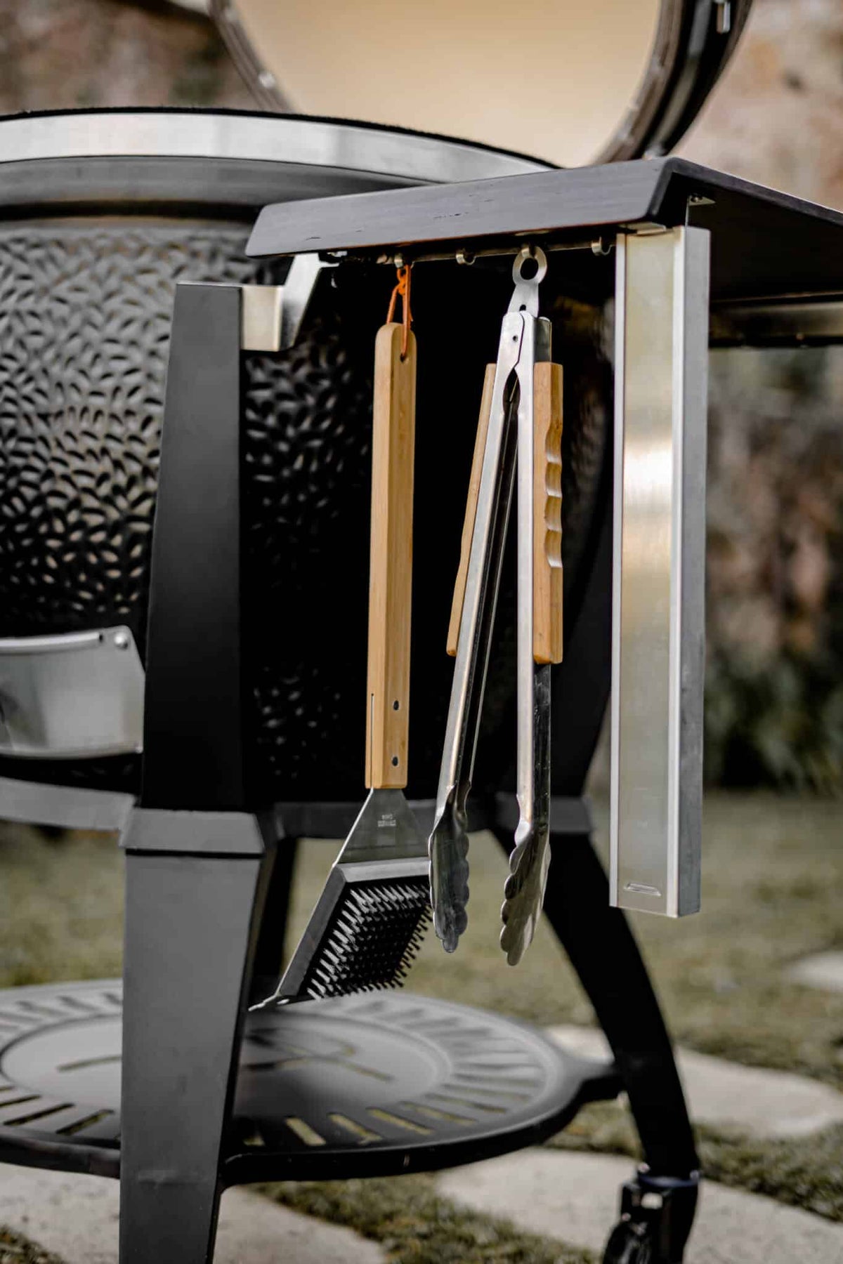 Tools hanging on Monolith Avantgarde grill