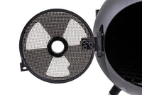 Close-up of Ozpig Series 2 Portable Wood Fired BBQ Stove door with mesh screen, designed for safe and efficient wood burning outdoors.