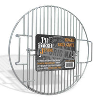 Pit Barrel Junior Hinged Grill Grate in packaging, labeled for dual-use cooking with easy drop-out hinge for hanging and grilling.