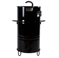 Black Pit Barrel Junior Grill with accessories for outdoor cooking