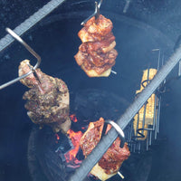 Close-up of meat cooking on Pit Barrel Junior smoker
