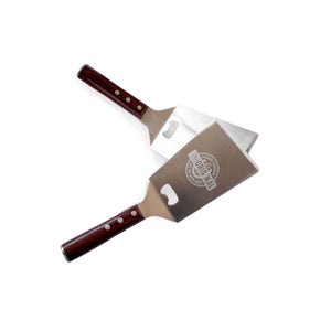 Two Pit Barrel Ultimate Spatulas - FireFly Barbecue with polished wooden handles and integrated bottle openers, perfect for BBQ enthusiasts.