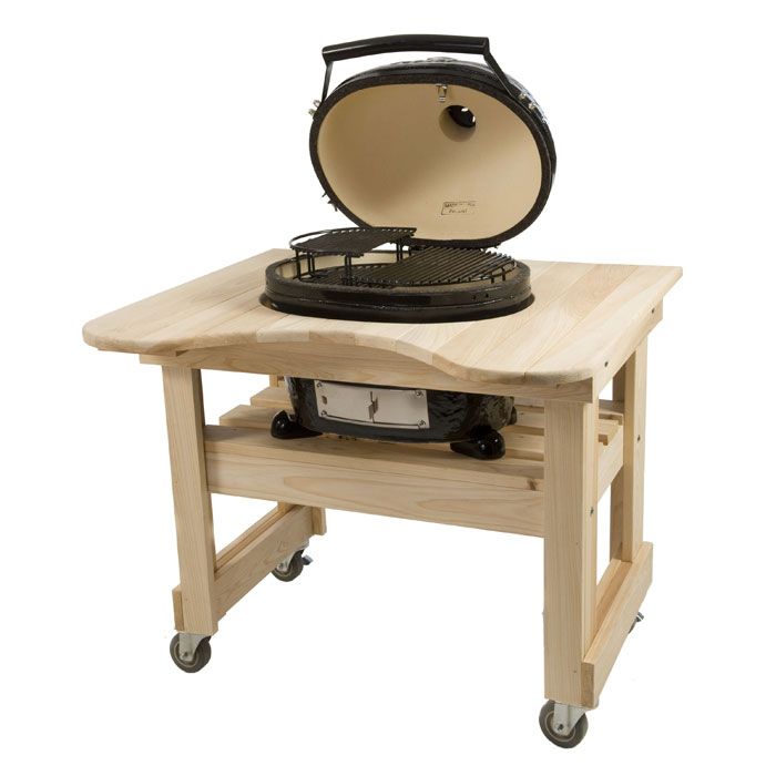 Unassembled Primo Cypress grill table on wooden stand with casters