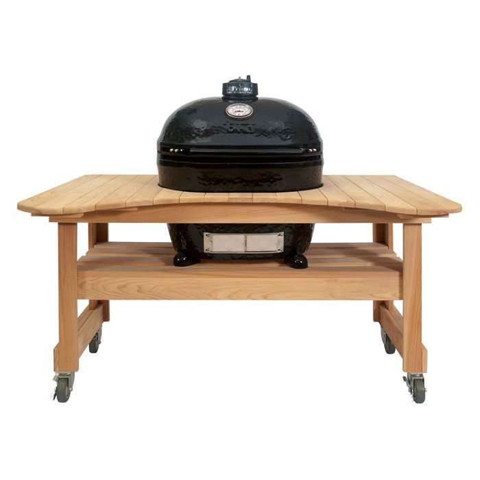 Primo grill with wooden table and wheels for outdoor barbecue