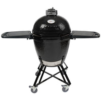 Primo Kamado Round Ceramic BBQ Grill on wheeled stand with foldable side shelves, ideal for outdoor cooking versatility and mobility.