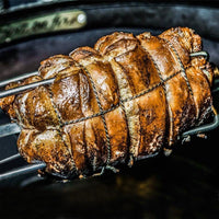 Rotisserie roast cooking on BBQ with Primo Rotisserie Kit