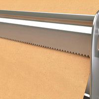 Close-up of peach paper roll on dispenser for outdoor kitchen use