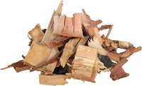 Close-up of chopped olive wood smoking chips for grilling and smoking