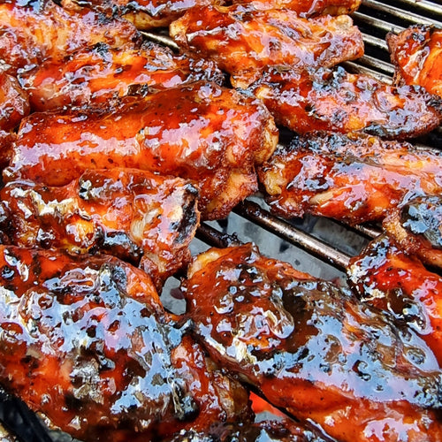 Grilled ribs coated in Tennessee Jalapeño BBQ Sauce