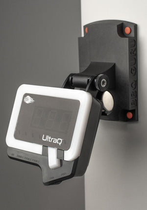 Wall-mounted UltraQ BBQ Guru controller with white LED ring, offering flexible installation for smart BBQ temperature management.