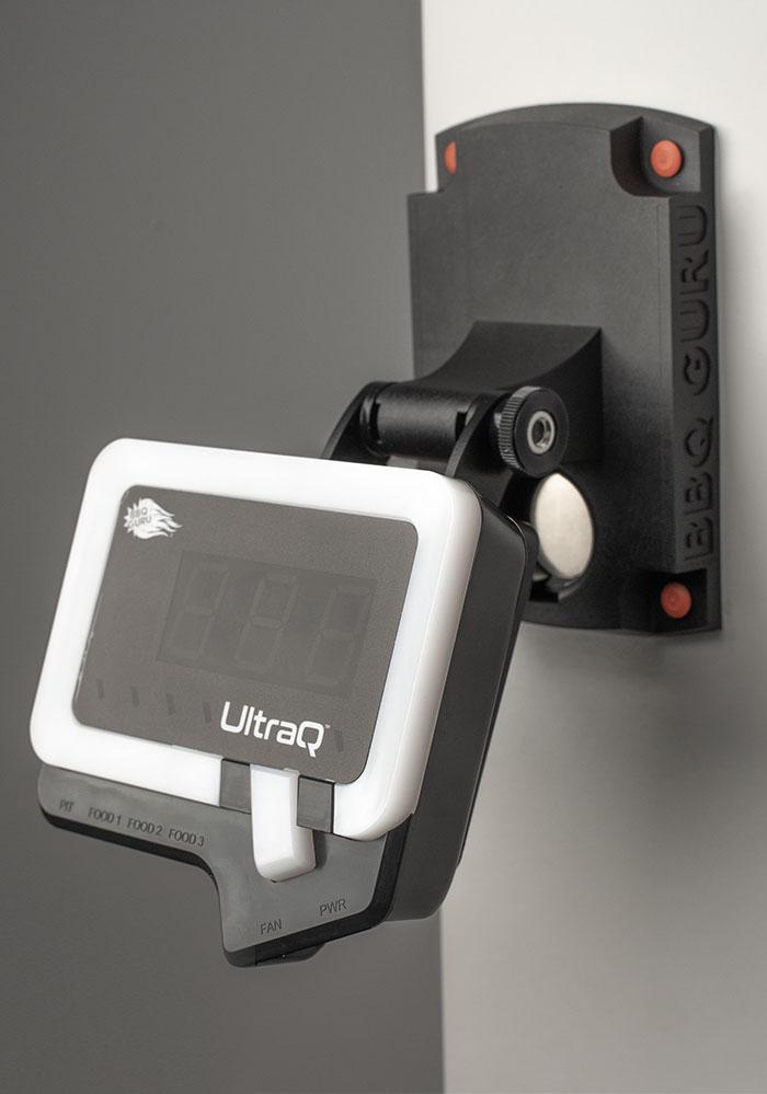 Wall-mounted UltraQ BBQ Guru controller with white LED ring, offering flexible installation for smart BBQ temperature management.