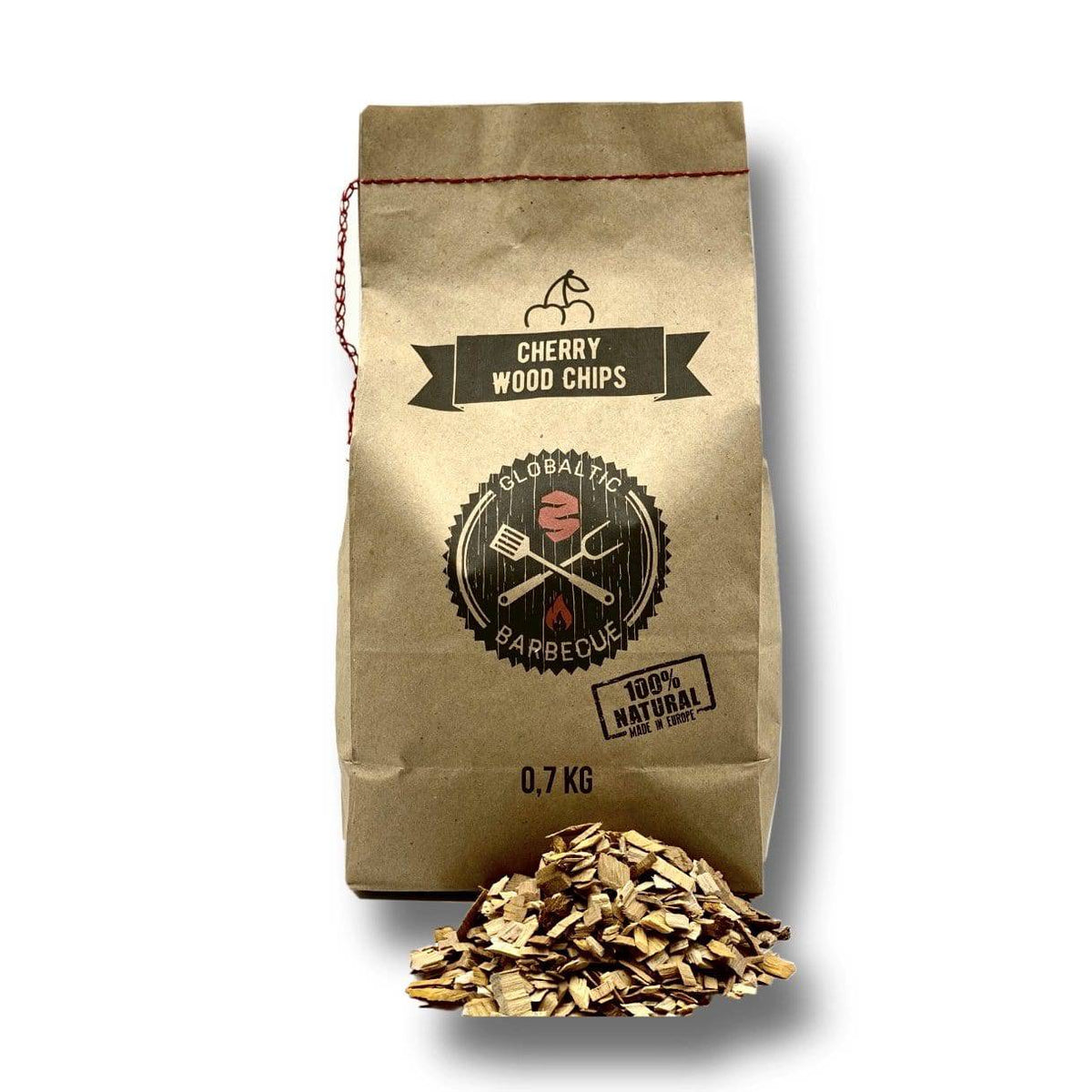Cherry wood smoking chips in paper bag with chips and pile of wood chips